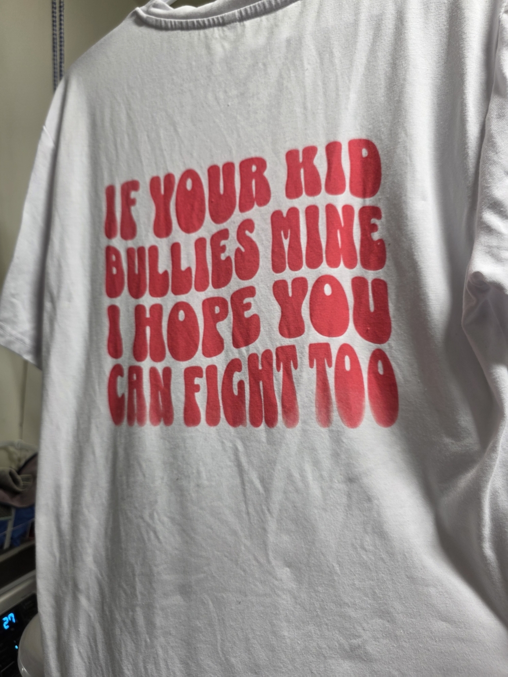 White Short-Sleeve Graphic Tee with Pink Skeleton Hand